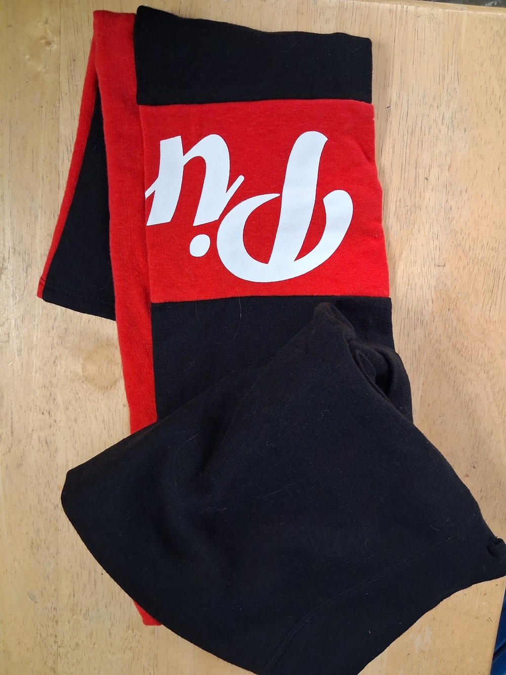 Victoria's Secret PINK sweatpants featuring a classic colorblock layout.
